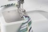 Bernina Piping Foot #C16L in use, sewing piping onto a medium weight fabric sample.